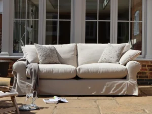 Tetrad Alexia Midi loose cover sofa in soft linen fabric, featuring removable and washable slipcovers for a relaxed, elegant look